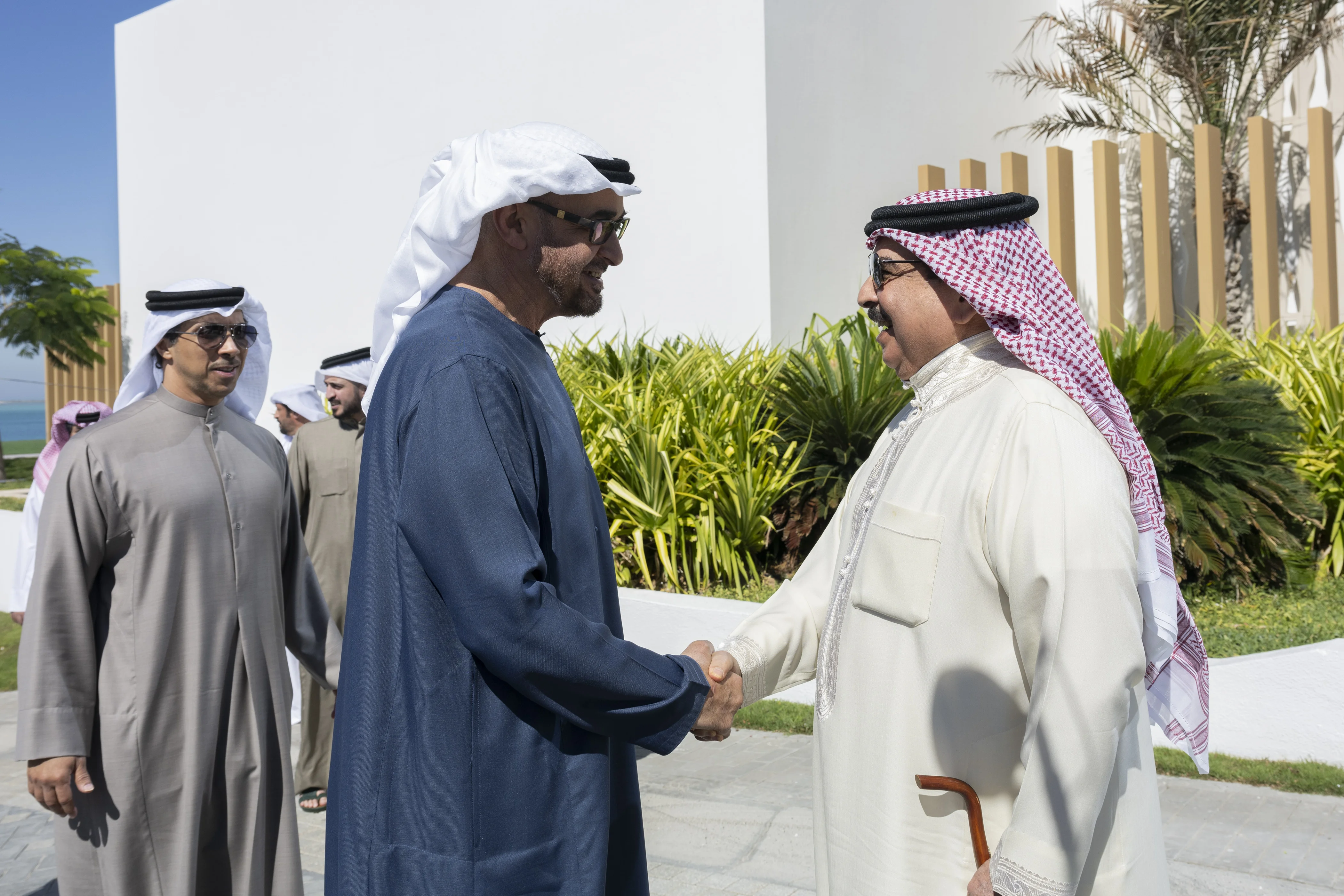 His Highness Sheikh Mohamed bin Zayed Al Nahyan, President of the United Arab Emirates greets King Hamad bin Isa Al Khalifa, King of Bahrain. Seen with His Highness Sheikh Mansour bin Zayed Al Nahyan, UAE Vice President and Deputy Prime Minister, January 2024