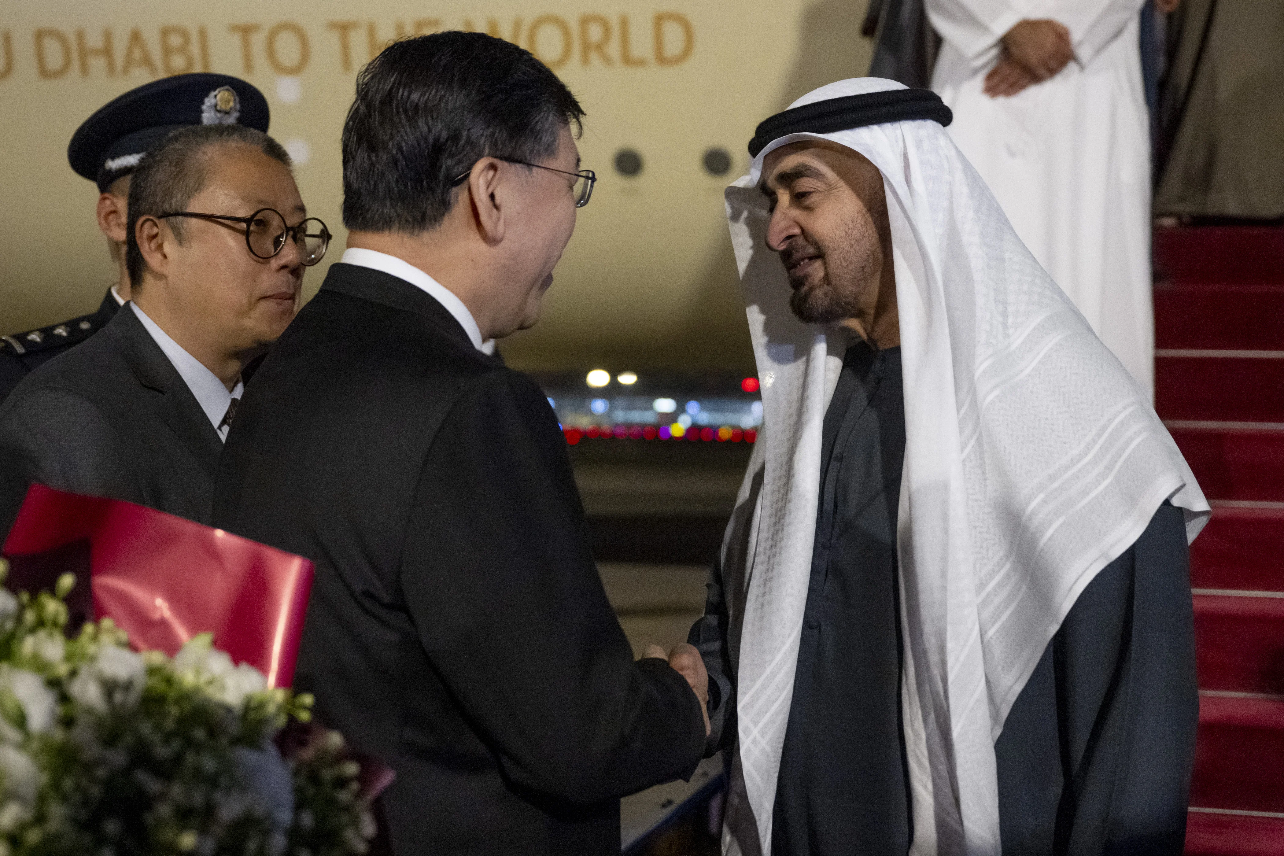 His Highness Sheikh Mohamed bin Zayed Al Nahyan, President of the United Arab Emirates, is received by Yin Hejun, Minister of Science and Technology upon arriving at Beijing Capital International Airport, commencing a state visit, May 2024