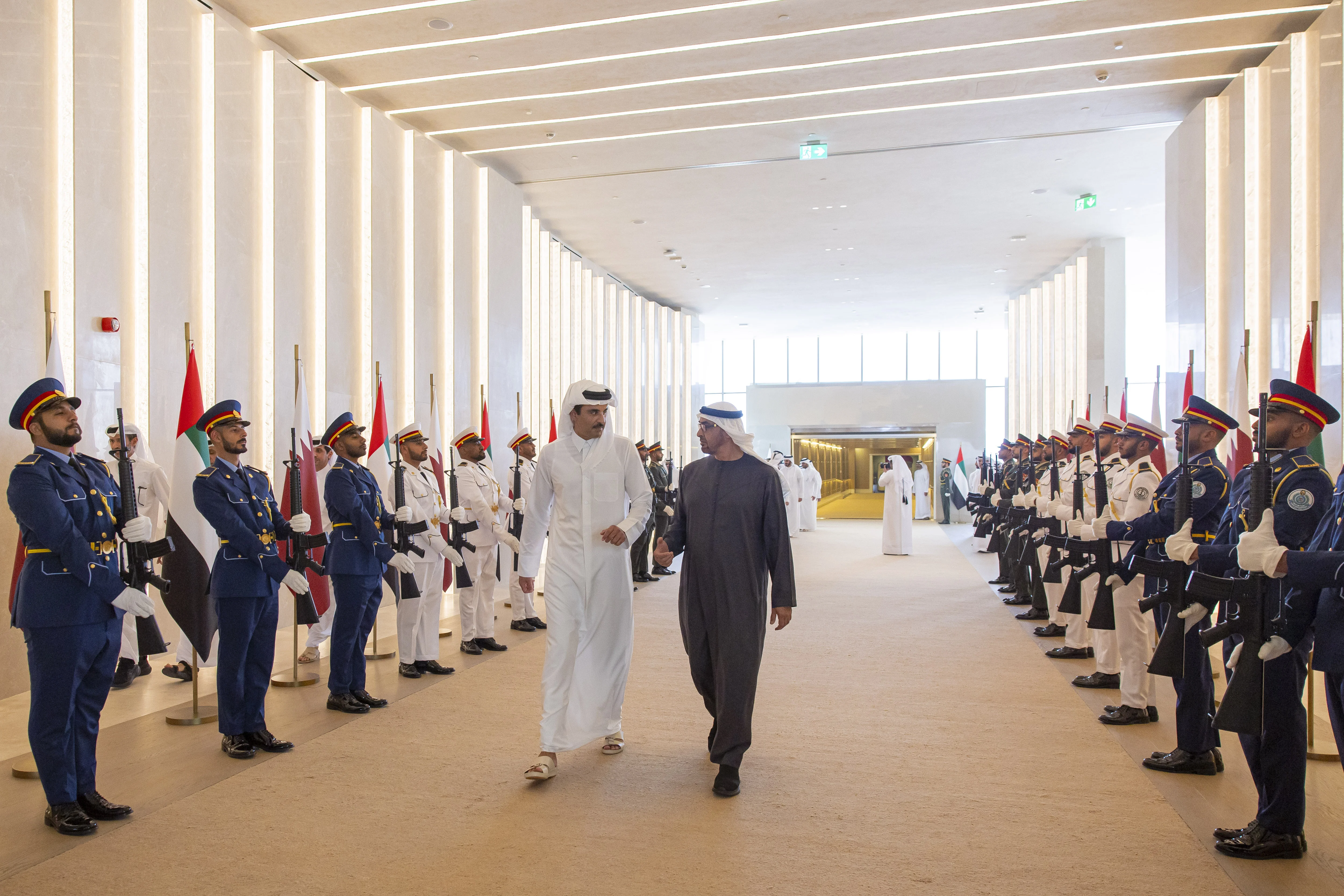 His Highness Sheikh Mohamed bin Zayed Al Nahyan, President of the United Arab Emirates, receives His Highness Sheikh Tamim bin Hamad Al Thani Emir of Qatar, at the Presidential Airport, June 2024
