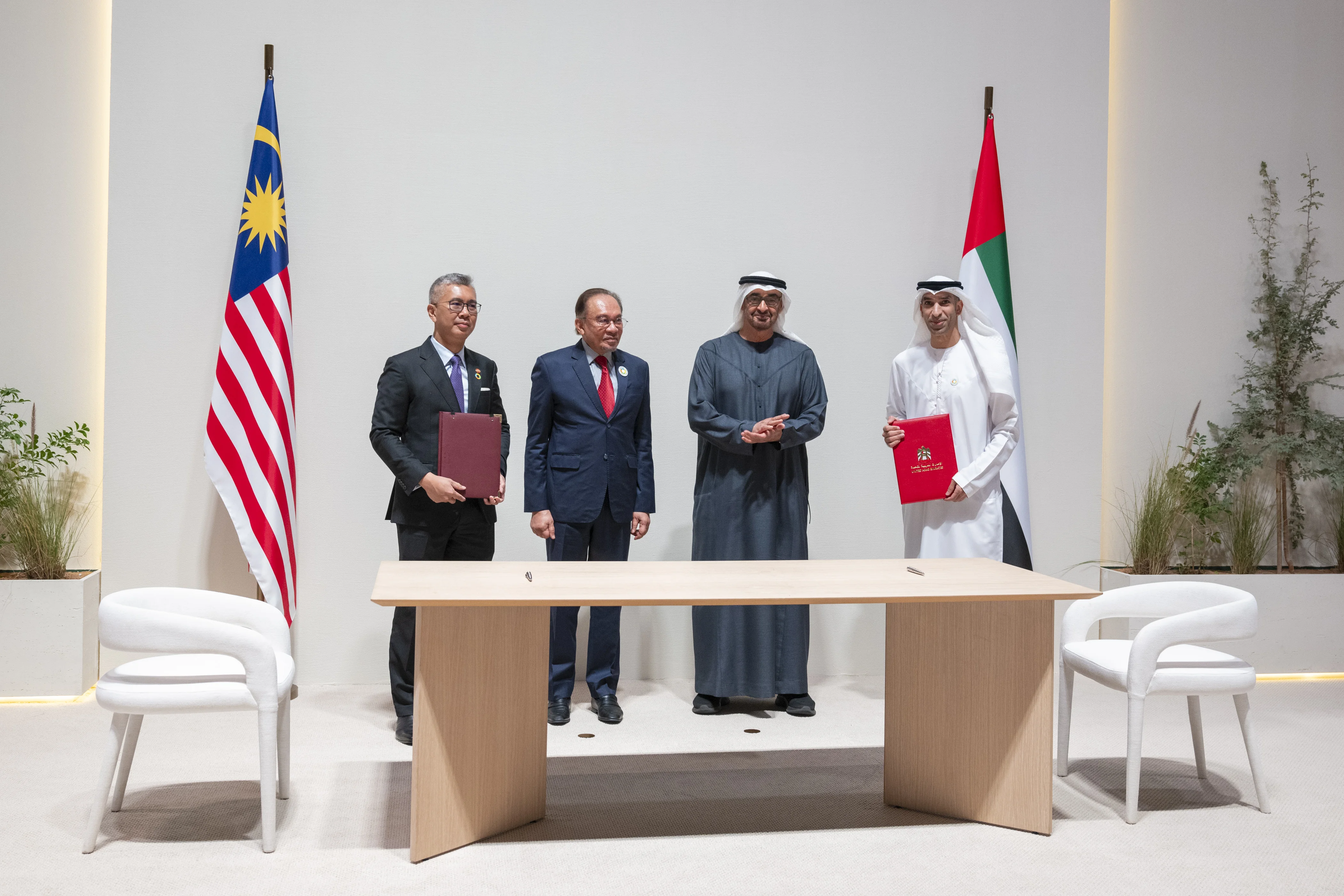 Dr Thani bin Ahmed Al Zeyoudi, UAE Minister of State for Foreign Trade, His Highness Sheikh Mohamed bin Zayed Al Nahyan, President of the United Arab Emirates, Anwar bin Ibrahim, Prime Minister of Malaysia and HtE Tengku Zafrul Aziz Minister of Investment, Trade and Industry of Malaysia, January 2025
