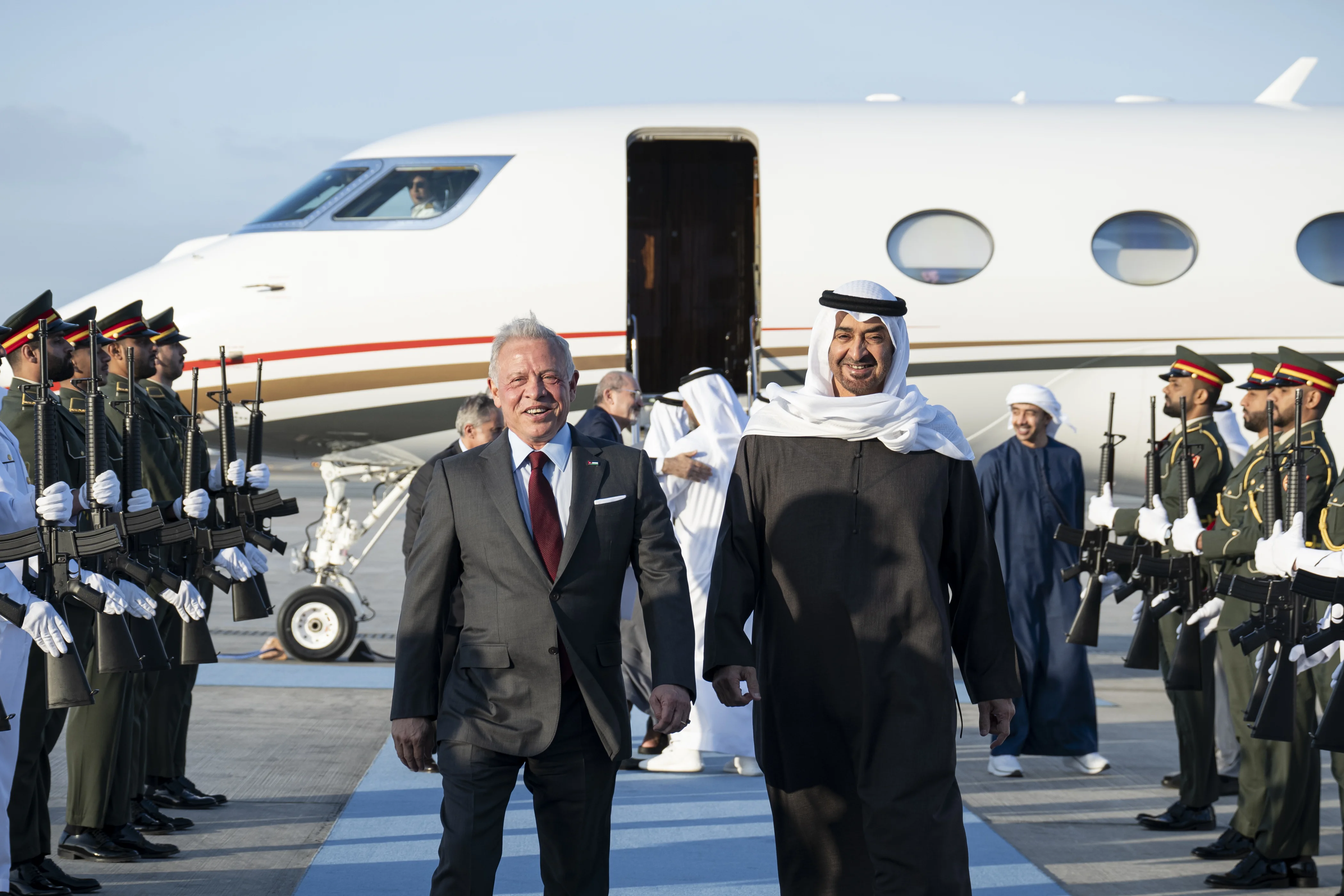 His Highness Sheikh Mohamed bin Zayed Al Nahyan, President of the United Arab Emirates, receives King Abdullah II, King of Jordan, at Al Bateen Airport, March 2025