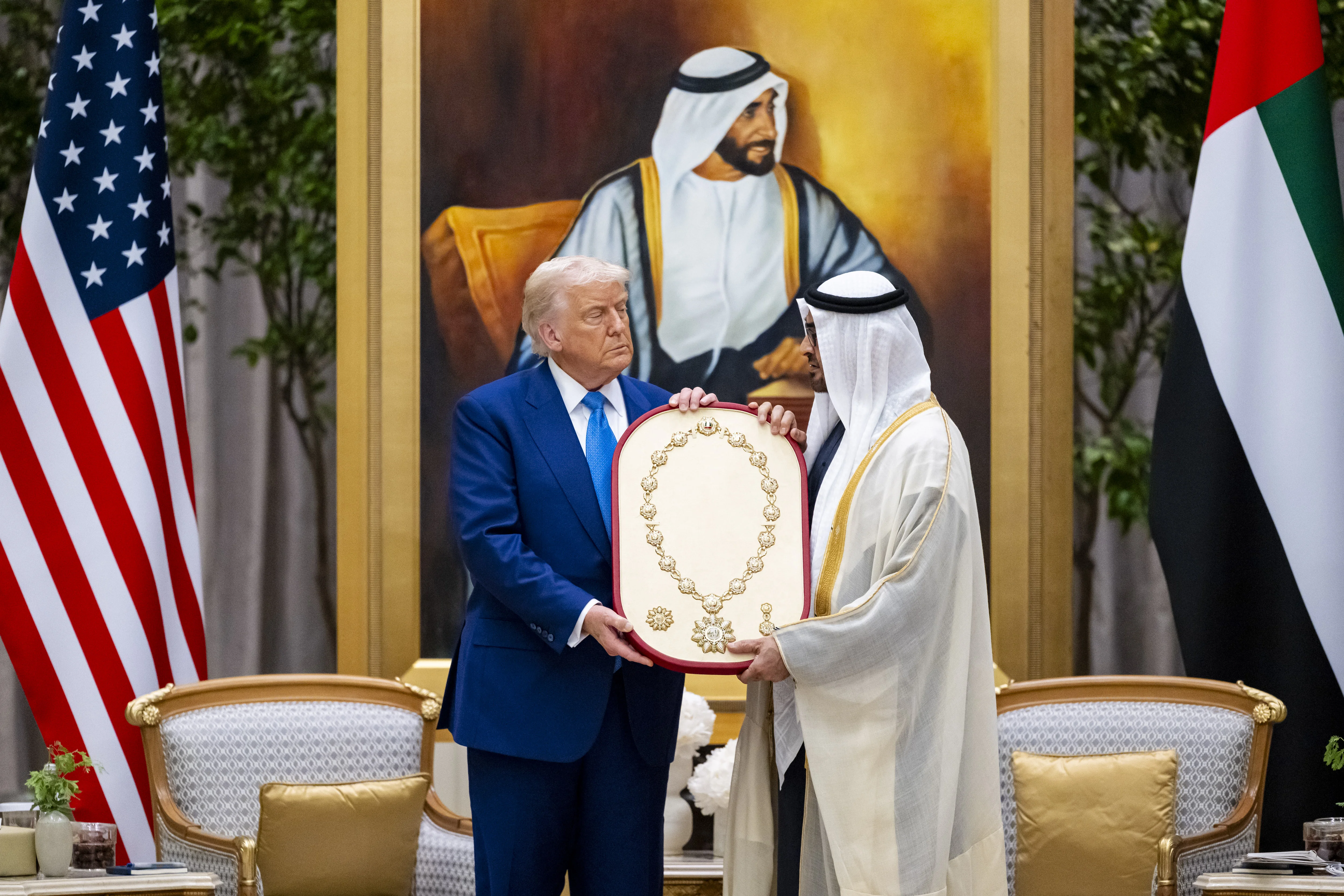 His Highness Sheikh Mohamed bin Zayed Al Nahyan, President of the United Arab Emirates, presents the Order of Zayed Medal to Donald Trump, President of the United States of America, during a state visit reception at Qasr Al Watan, May 2025