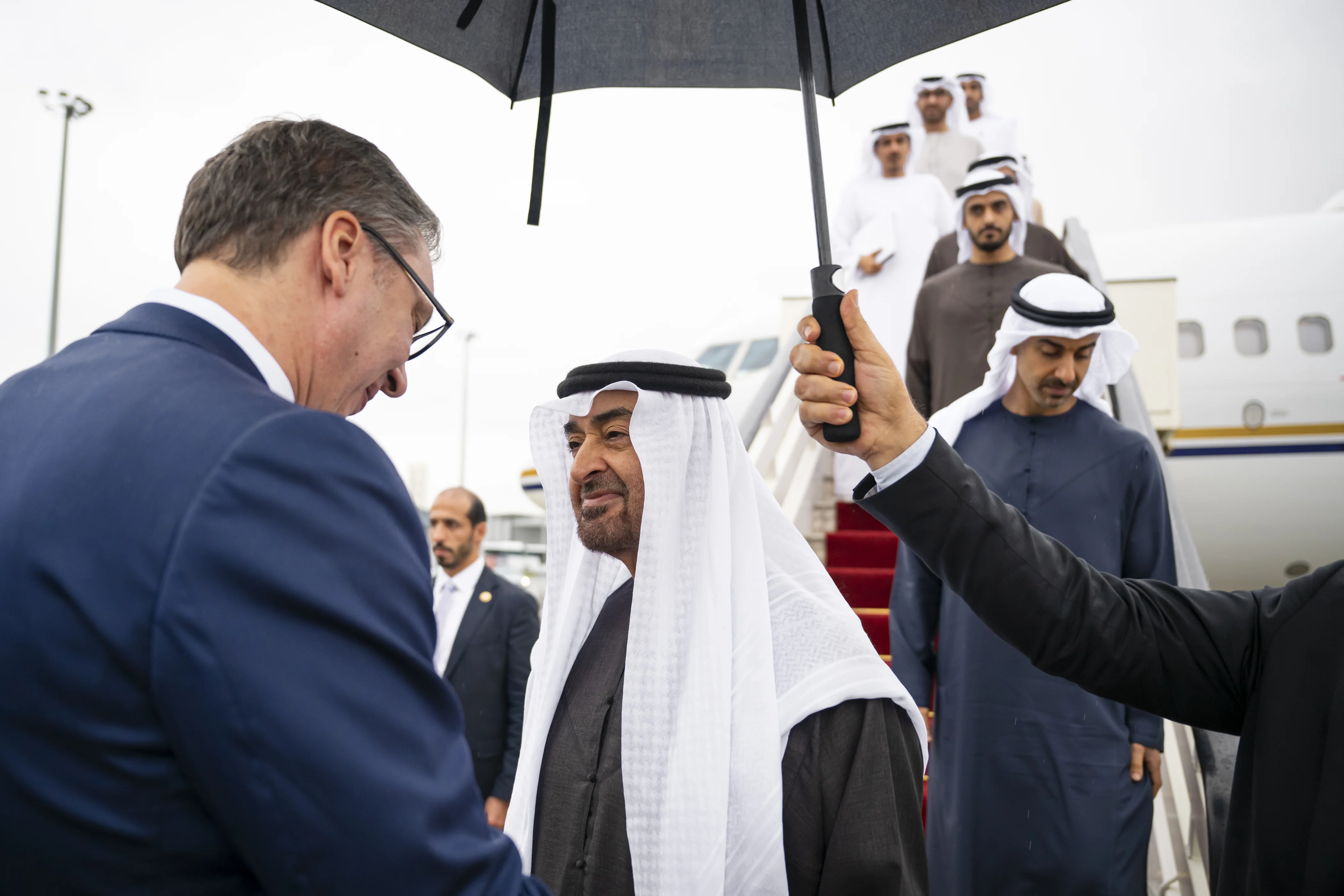 His Highness Sheikh Mohamed bin Zayed Al Nahyan, President of the United Arab Emirates, is received by Aleksandar Vucic, President of Serbia, upon arriving at Belgrade Nikola Tesla Airport during a working visit, July 2025