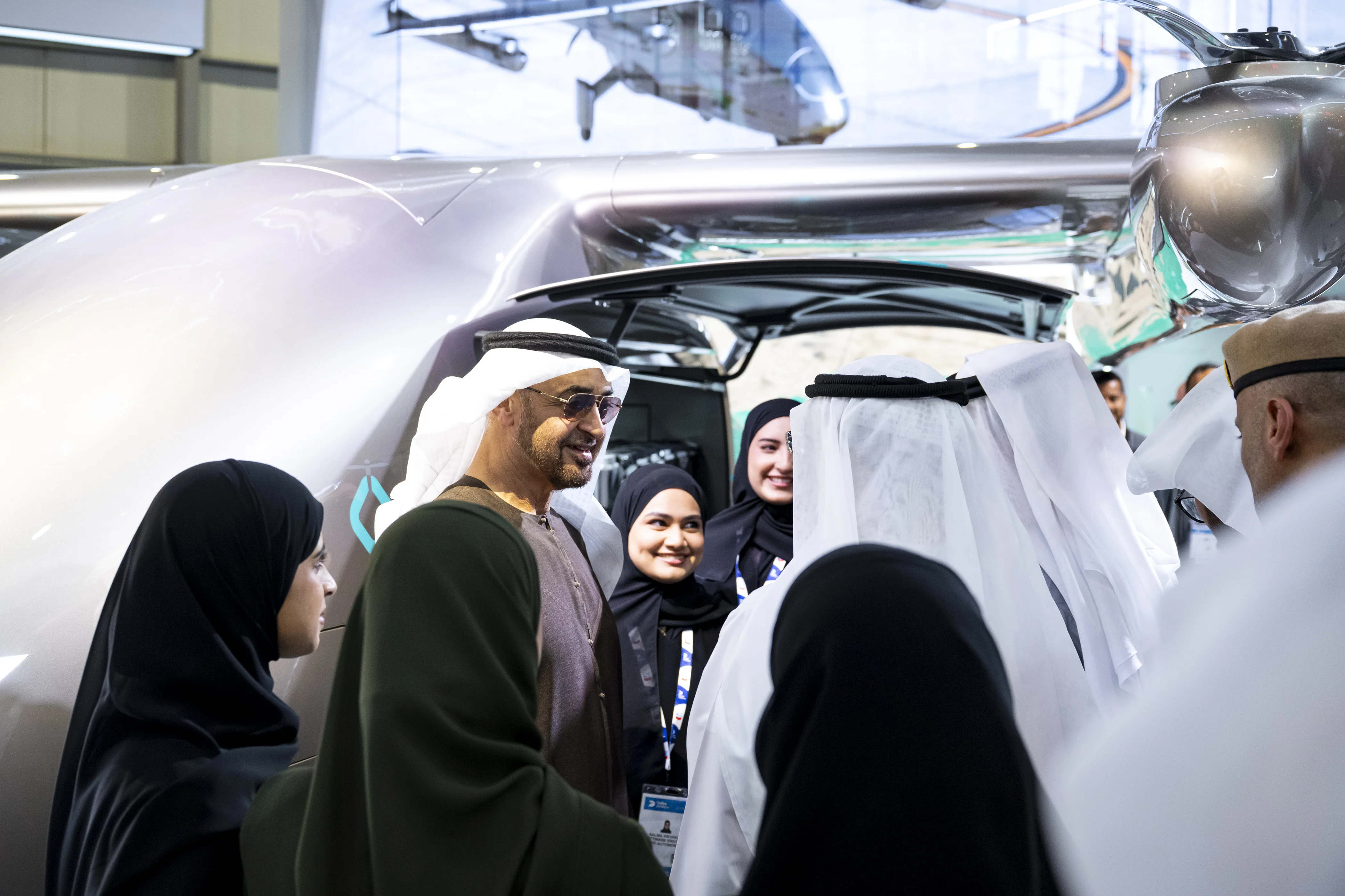 His Highness Sheikh Mohamed bin Zayed Al Nahyan, President of the United Arab Emirates, speaks with representatives from LODD Autonomous, during a tour of the Dubai Airshow 2025, at Dubai World Central, November 2025